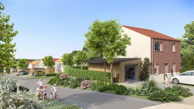 Maisons en brique avec jardins aménagés et allées pavées sous un ciel dégagé.