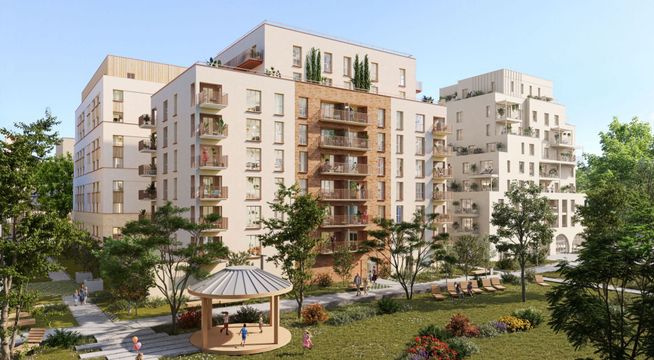 Immeubles résidentiels modernes de six étages avec façades beige et crème, entourés de verdure et d'arbres.