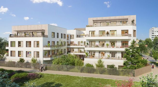 Ensemble immobilier moderne avec façades beiges, balcons et terrasses, entouré de verdure et ciel bleu.