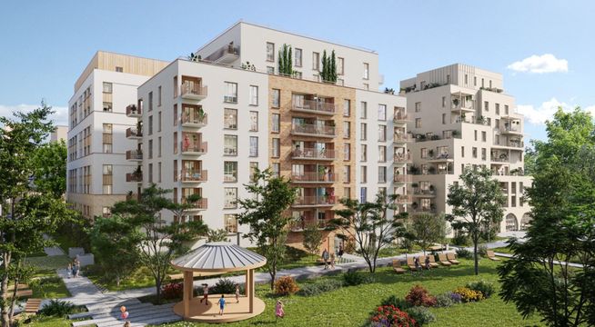 Immeubles résidentiels modernes de plusieurs étages avec façades claires, entourés de verdure et d'arbres.