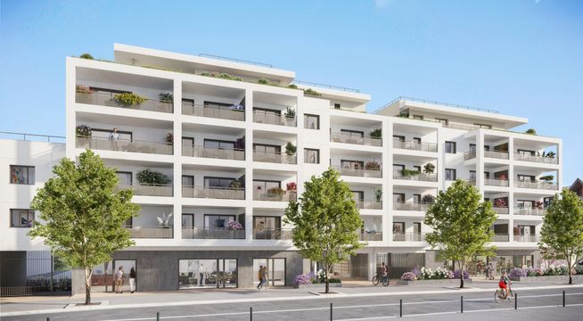 Immeuble résidentiel moderne de cinq étages avec façade grise et blanche, commerces au rez-de-chaussée et arbres en façade.