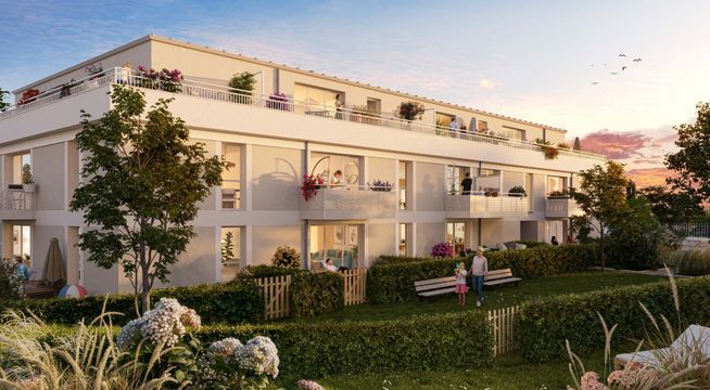Immeuble résidentiel moderne de trois étages en façade beige avec balcons, entouré de végétation et d'arbres.
