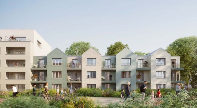 Rangée d'immeubles d'habitation modernes aux façades colorées, bordée d'arbres verts.