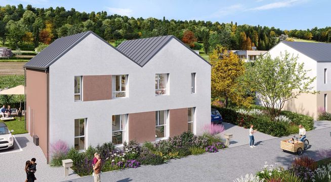 Maison moderne aux murs rose pâle avec toiture grise, entourée d'arbres et de verdure.