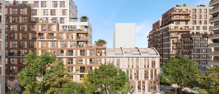 Vue aérienne d'une avenue urbaine avec immeubles haussmanniens, arbres verts et ciel bleu.